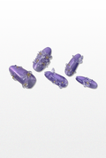 Set of purple floral press-ons.