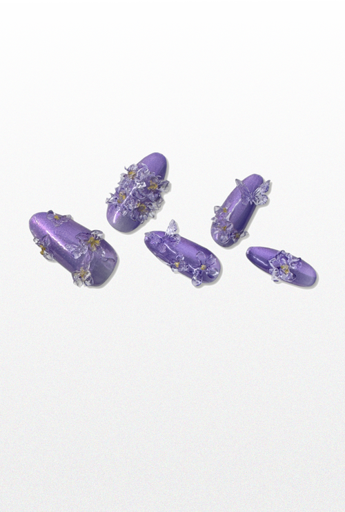 Set of purple floral press-ons.