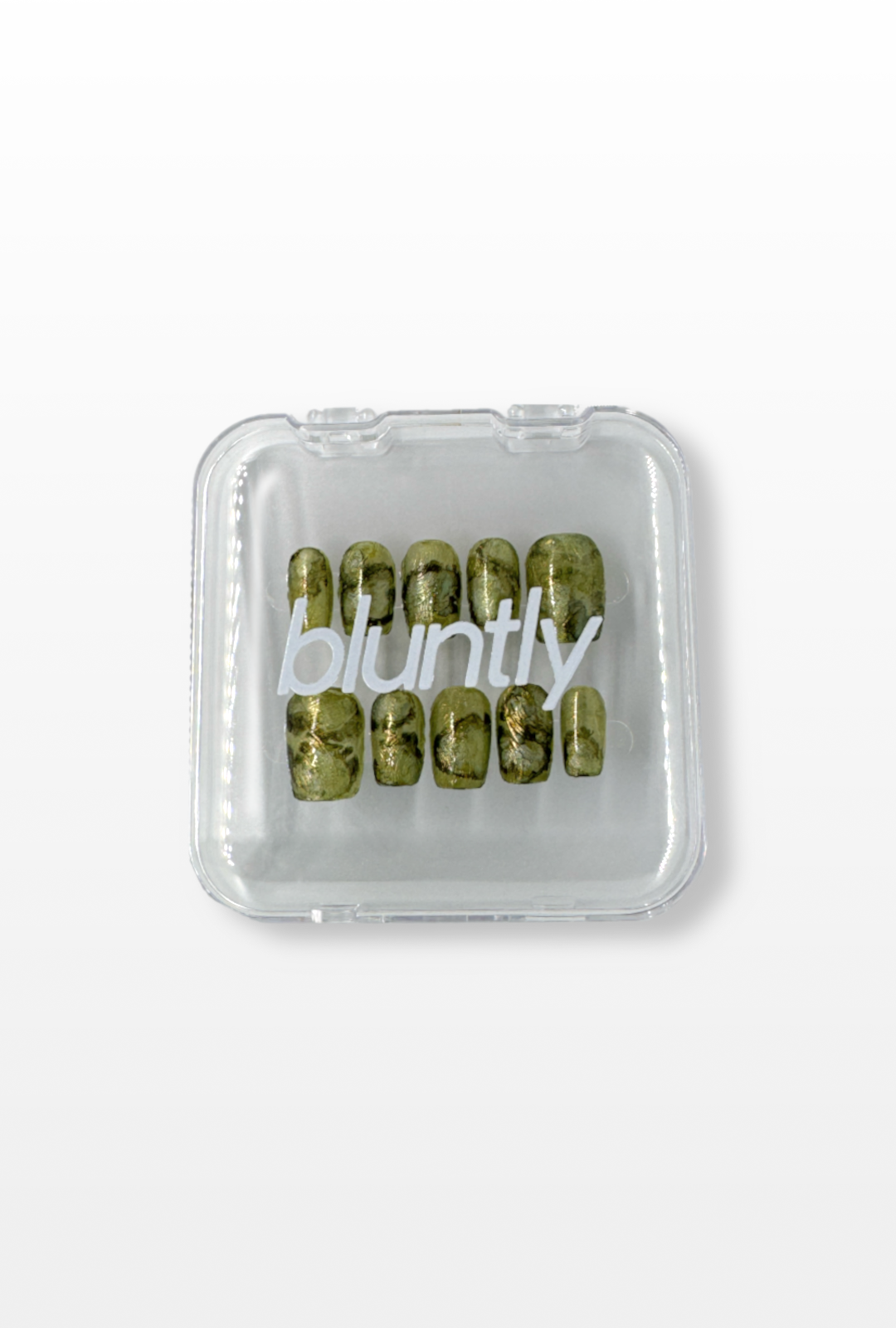 Clear plastic case with green press-ons, labeled 'bluntly' on a white background